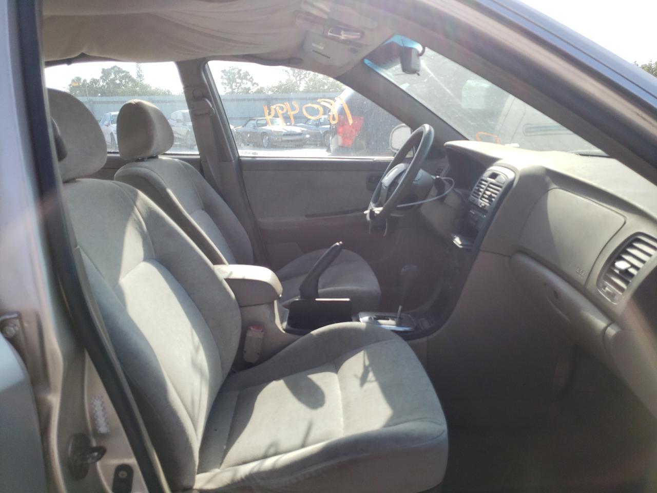 Photo 5 from auction – 2004 KIA OPTIMA LX with VIN KNAGD126845276782