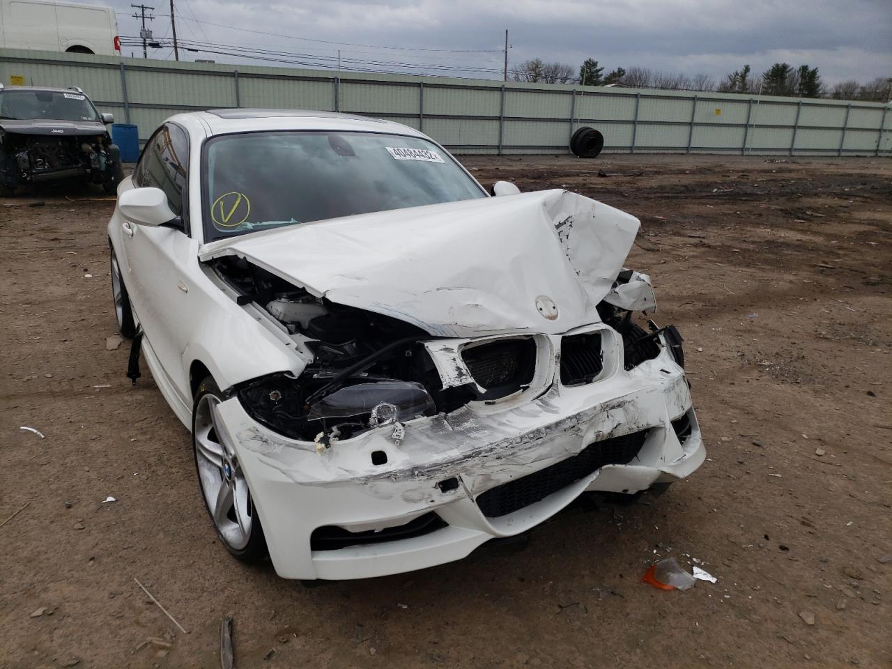 BMW 135 I 2011 with VIN WBAUC9C58BVM08950 - Photo from auction