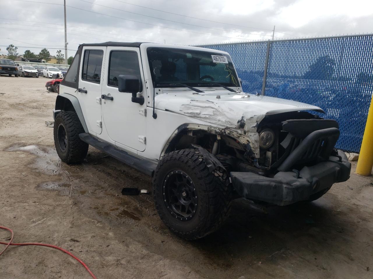 JEEP WRANGLER U 2011 with VIN 1J4BA3H14BL563200 - Photo from auction