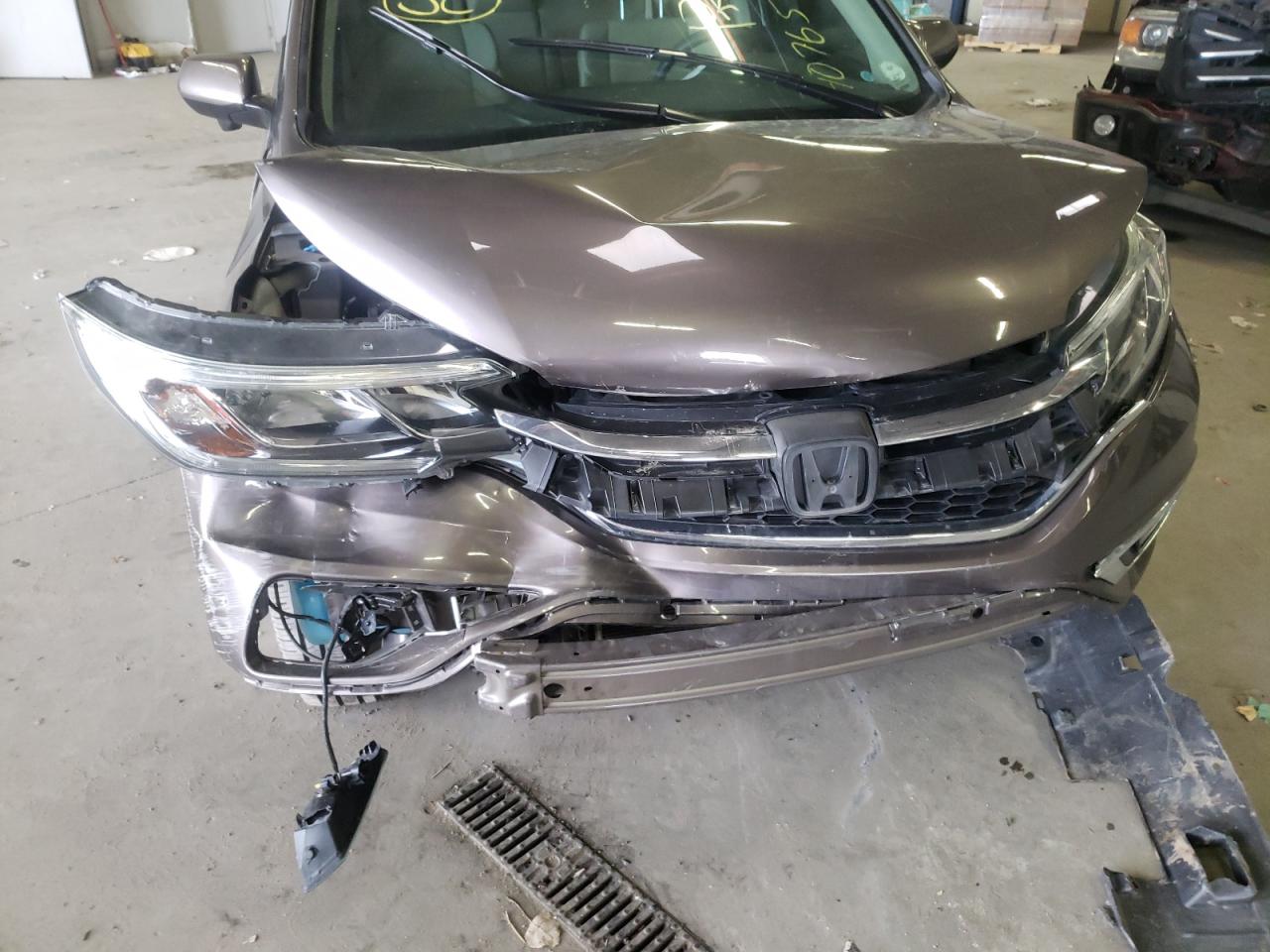 Photo 9 from auction – 2015 HONDA CR-V EX with VIN 2HKRM4H53FH664677