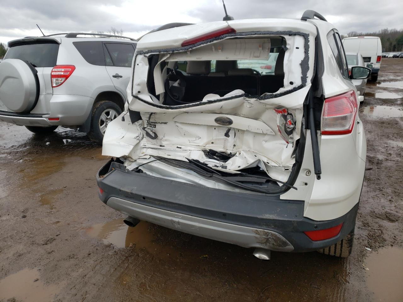 Photo 9 from auction – 2014 FORD ESCAPE SE with VIN 1FMCU9G97EUE49813