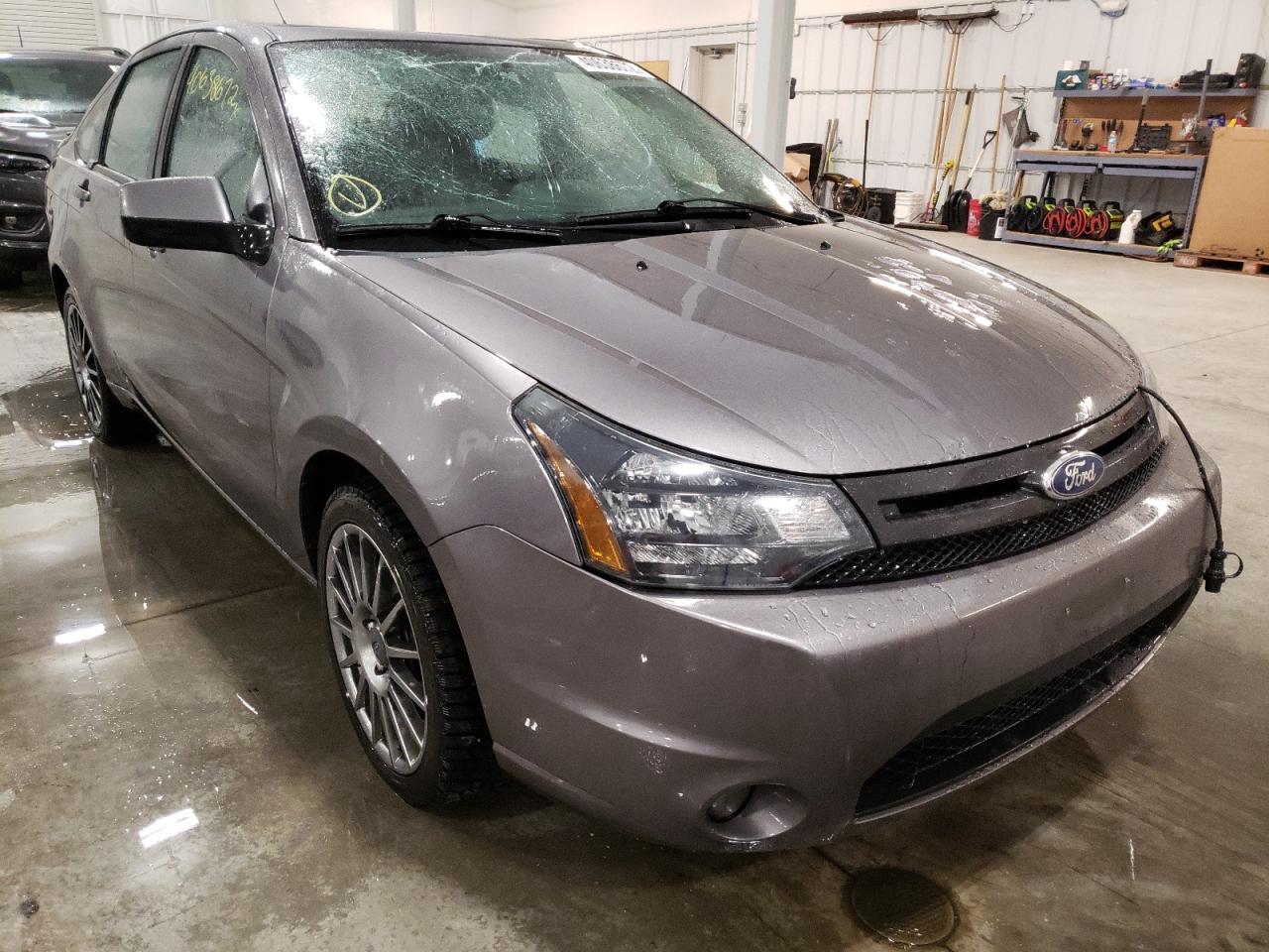 FORD FOCUS SES 2011 with VIN 1FAHP3GNXBW194270 - Photo from auction