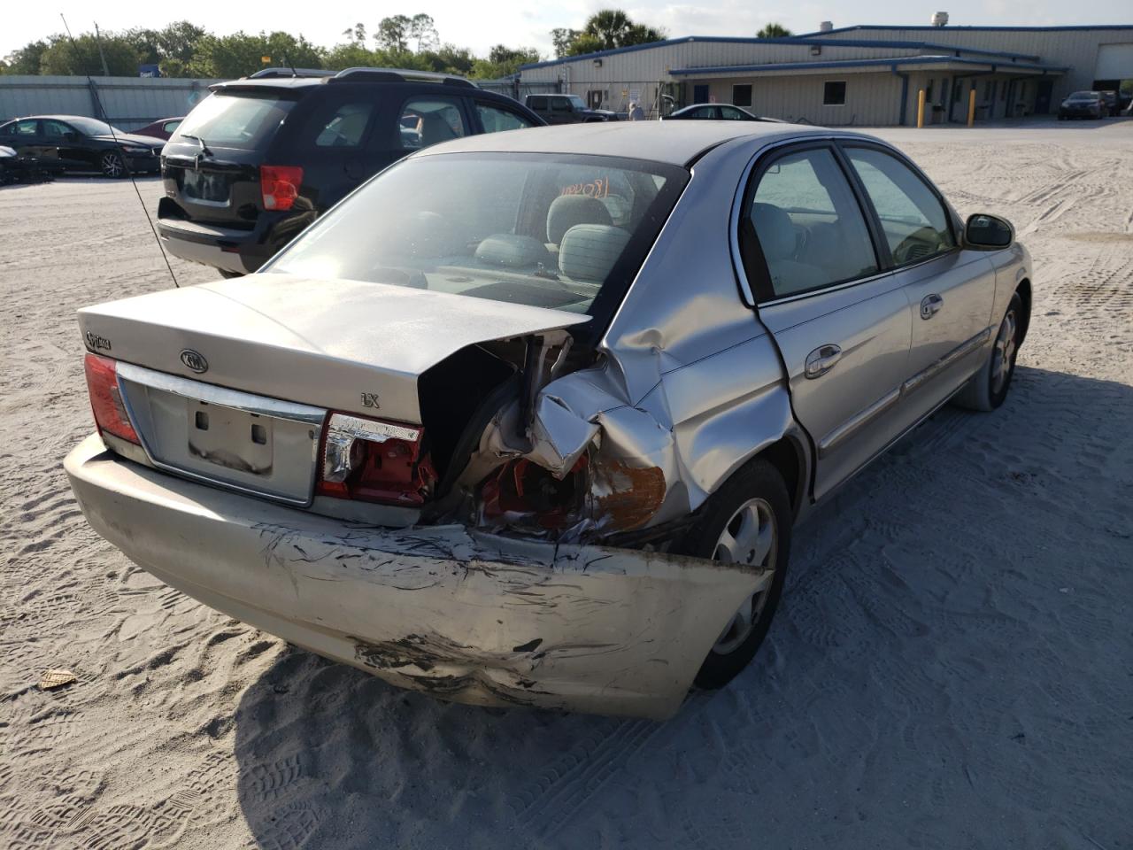 Photo 4 from auction – 2004 KIA OPTIMA LX with VIN KNAGD126845276782