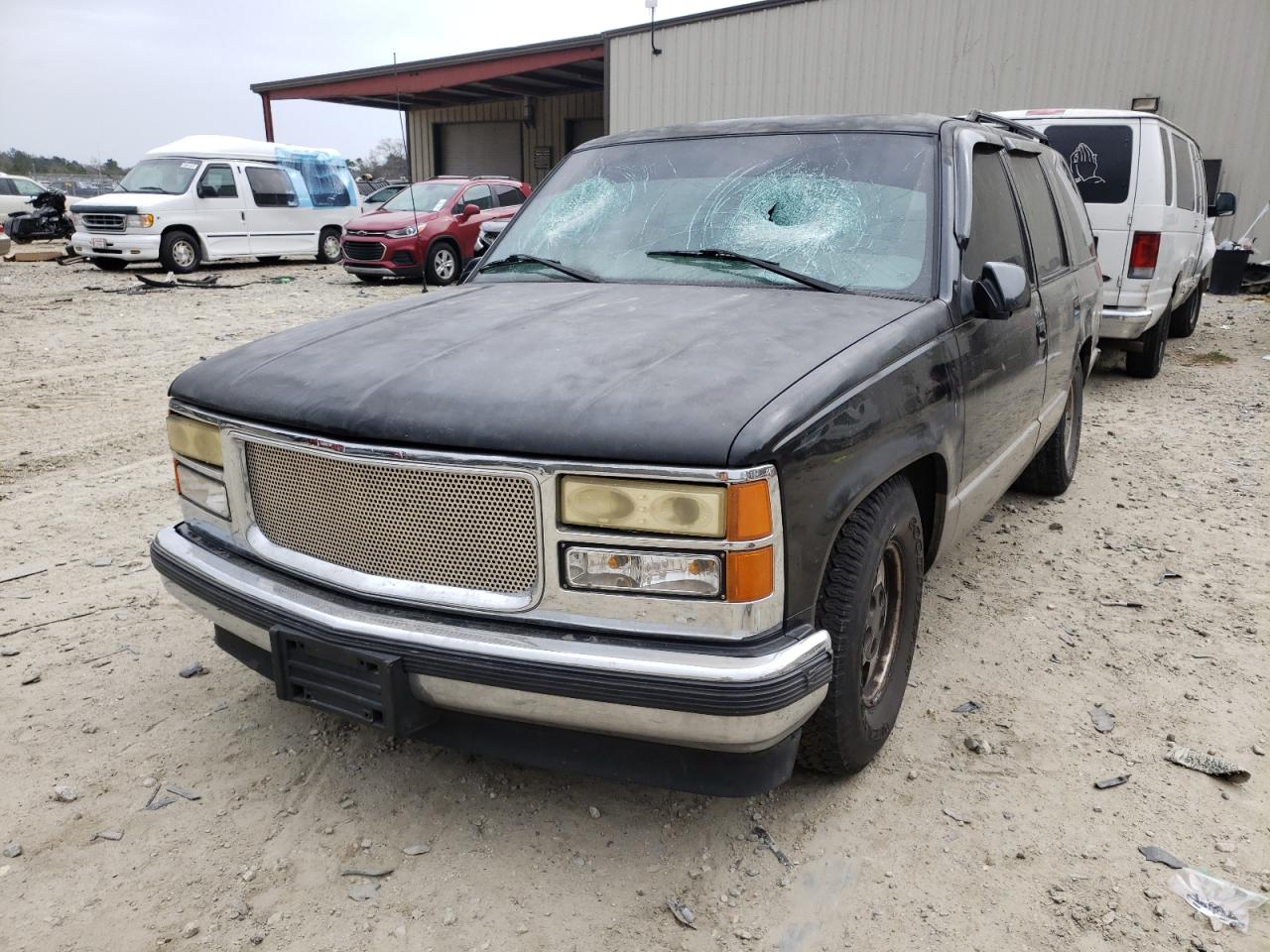 Photo 2 from auction – 1999 GMC YUKON with VIN 1GKEC13R2XJ809487