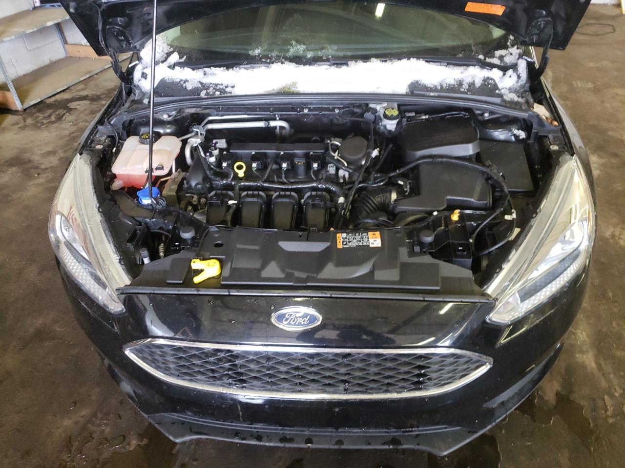 Photo 7 from auction – 2015 FORD FOCUS SE with VIN 1FADP3F27FL341254