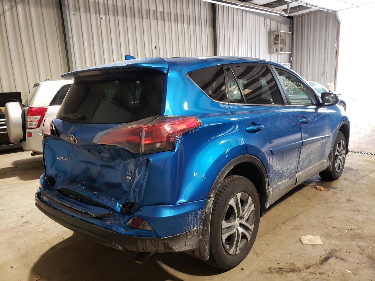 Photo 4 from auction – 2018 TOYOTA RAV4 LE with VIN JTMBFREVXJJ181569