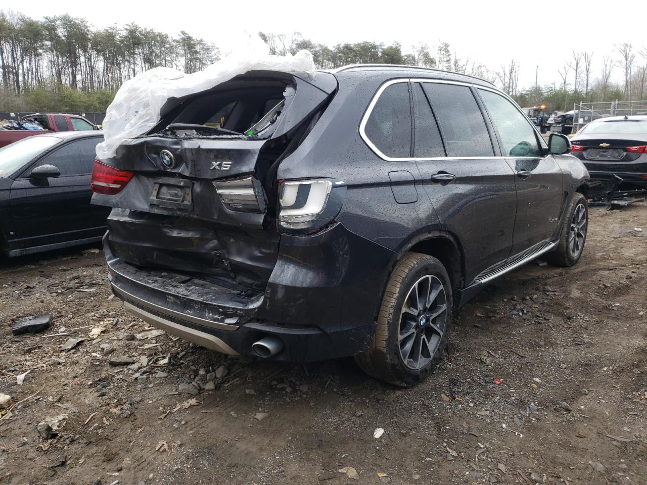 Photo 4 from auction – 2014 BMW X5 XDRIVE3 with VIN 5UXKR0C5XE0H20873