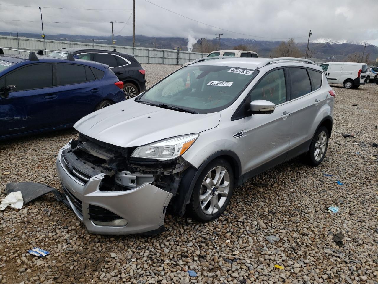 Photo 2 from auction – 2015 FORD ESCAPE TIT with VIN 1FMCU9J98FUA32906