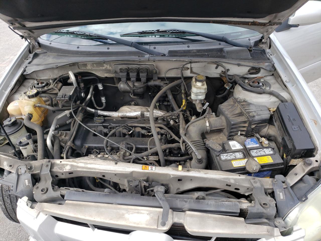 Photo 7 from auction – 2005 MAZDA TRIBUTE I with VIN 4F2YZ02Z35KM61547