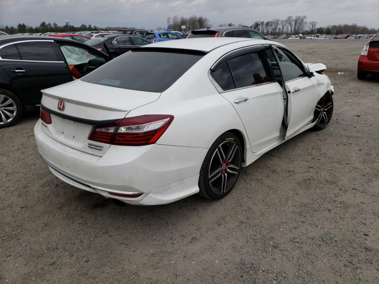 Photo 13 from auction – 2017 HONDA ACCORD SPO with VIN 1HGCR2F11HA045082