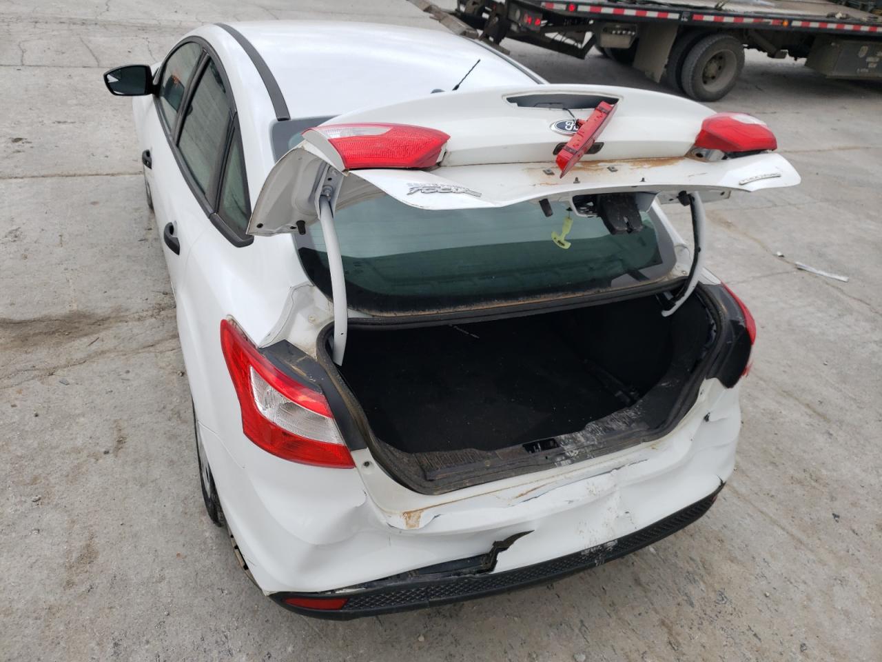 Photo 9 from auction – 2014 FORD FOCUS S with VIN 1FADP3E22EL282632