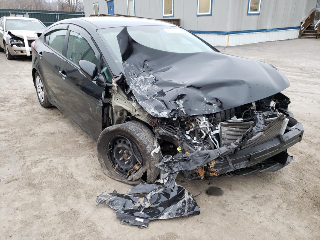 KIA FORTE LX 2017 with VIN 3KPFK4A71HE125390 - Photo from auction