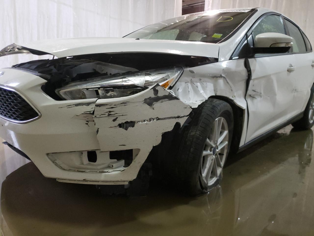 Photo 9 from auction – 2017 FORD FOCUS SE with VIN 1FADP3K27HL249022