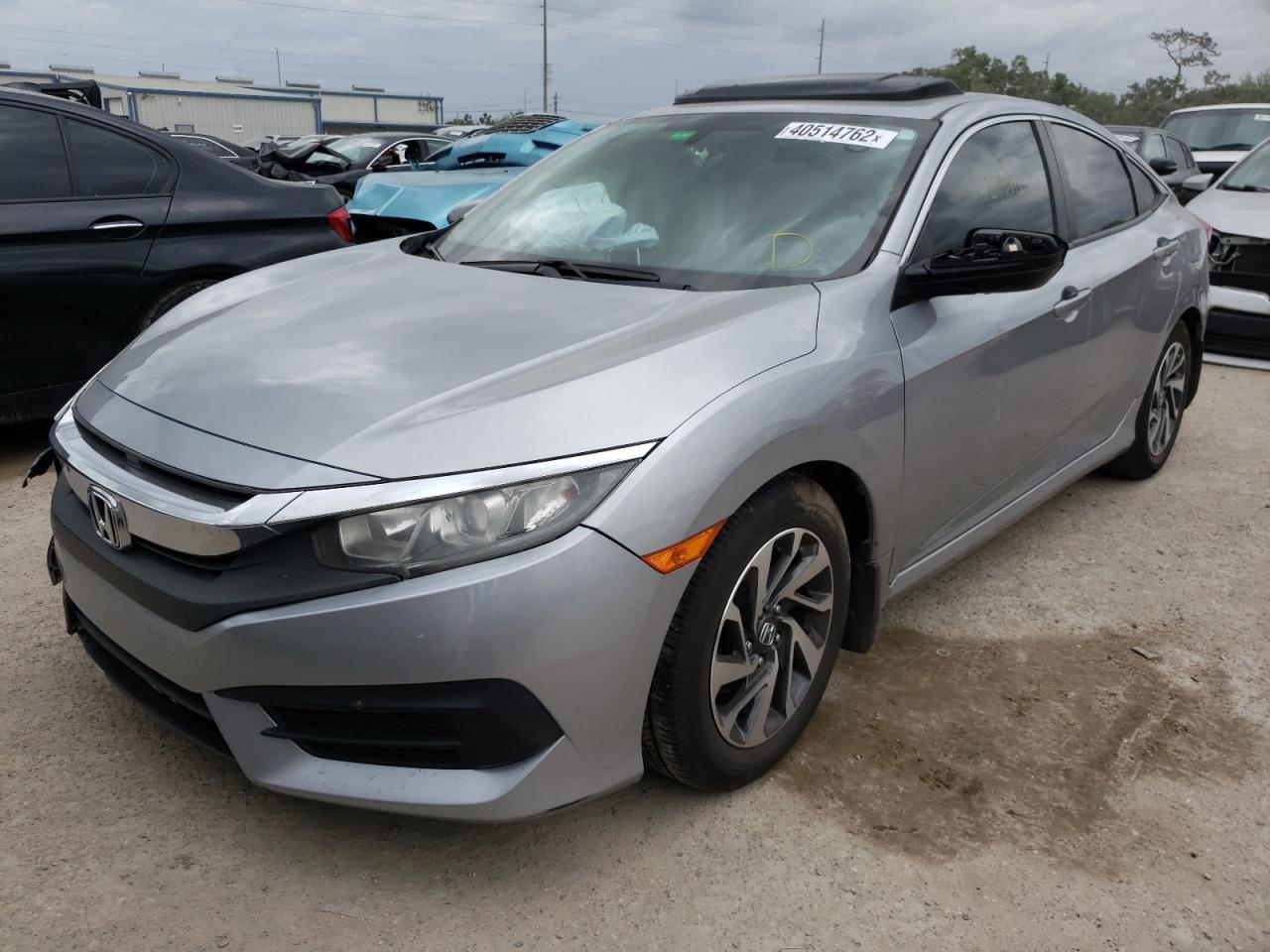 Photo 2 from auction – 2016 HONDA CIVIC EX with VIN 19XFC2F77GE093392