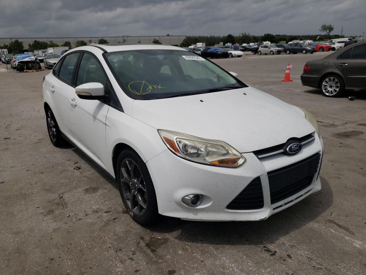 FORD FOCUS SE 2013 with VIN 1FADP3F22DL308885 - Photo from auction