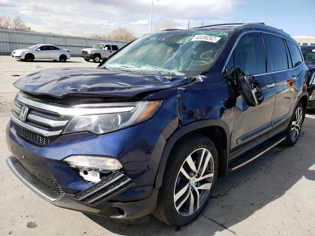 Photo 2 from auction – 2016 HONDA PILOT ELIT with VIN 5FNYF6H00GB123074