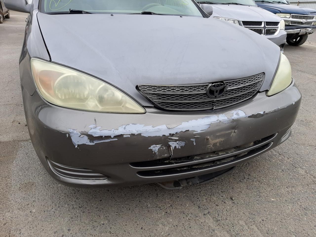 Photo 9 from auction – 2004 TOYOTA CAMRY LE with VIN 4T1BF32K34U574061