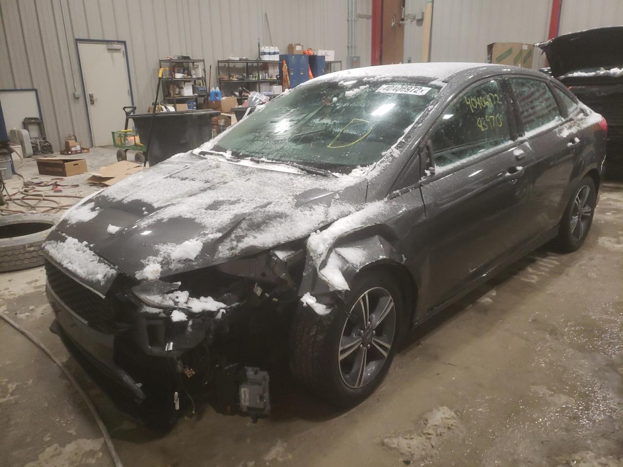 Photo 2 from auction – 2016 FORD FOCUS SE with VIN 1FADP3F2XGL233700