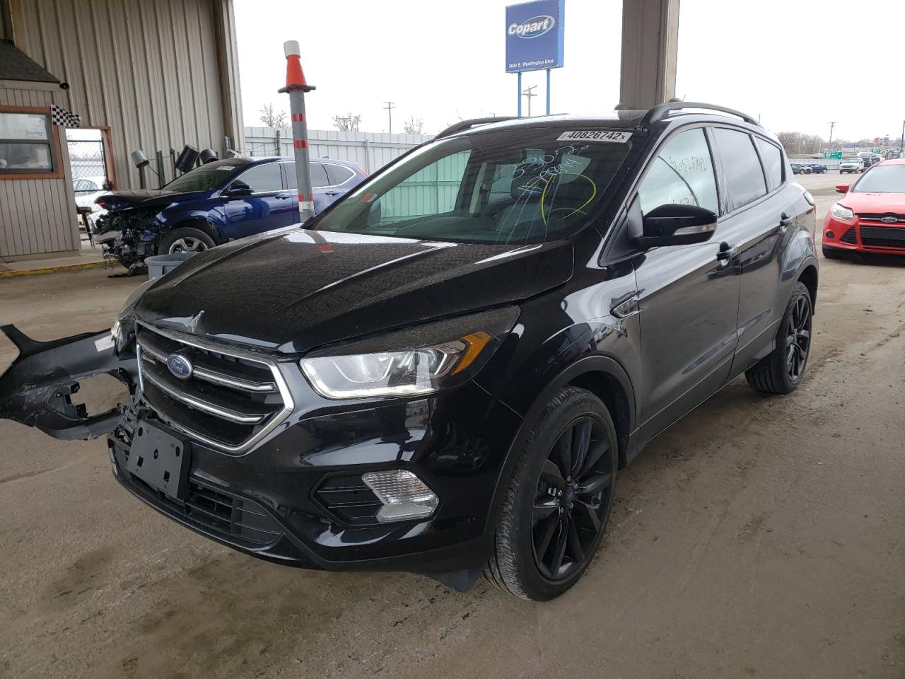 Photo 2 from auction – 2017 FORD ESCAPE TIT with VIN 1FMCU0JD7HUD83230