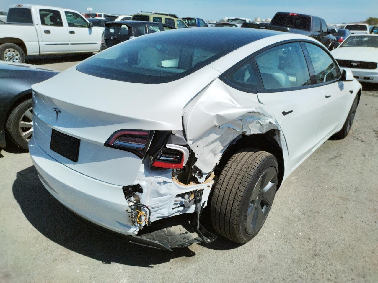 Photo 4 from auction – 2021 TESLA MODEL 3 with VIN 5YJ3E1EA8MF089944