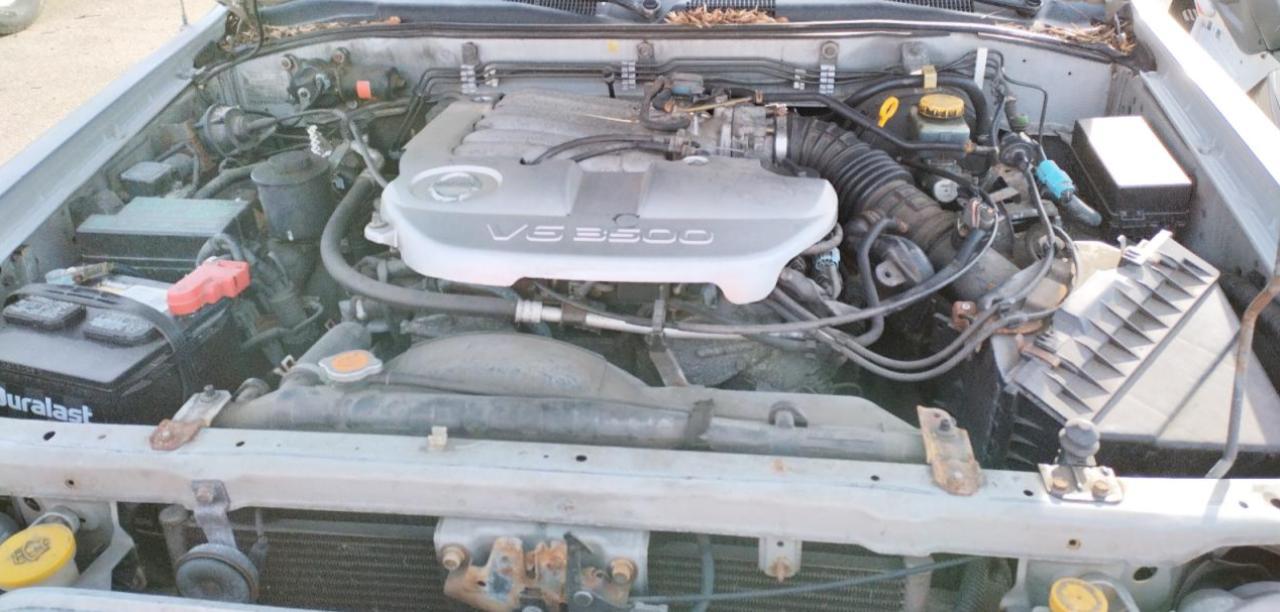 Photo 7 from auction – 2002 NISSAN PATHFINDER with VIN JN8DR09Y32W718596