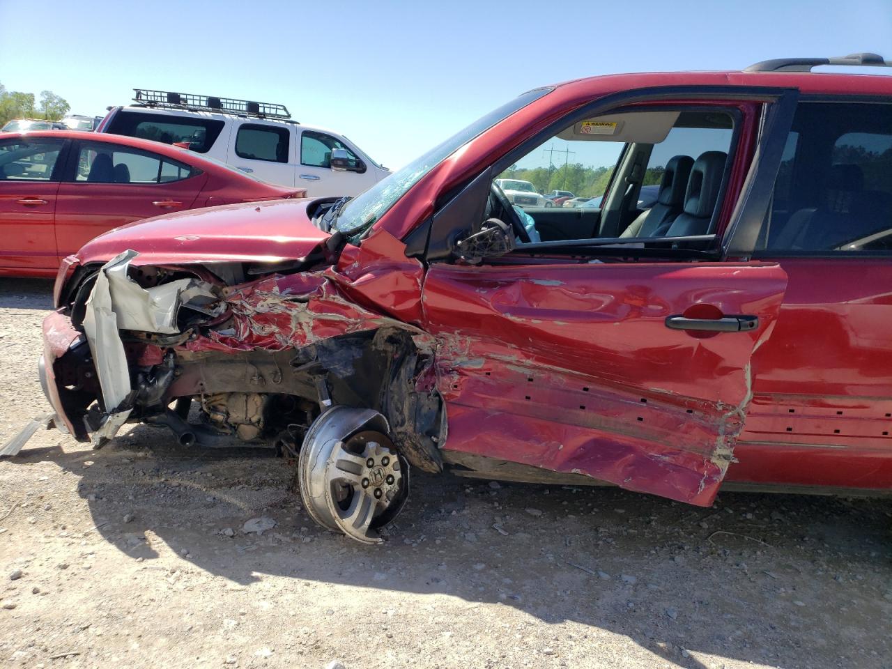 Photo 9 from auction – 2003 HONDA PILOT with VIN 2HKYF18633H519115