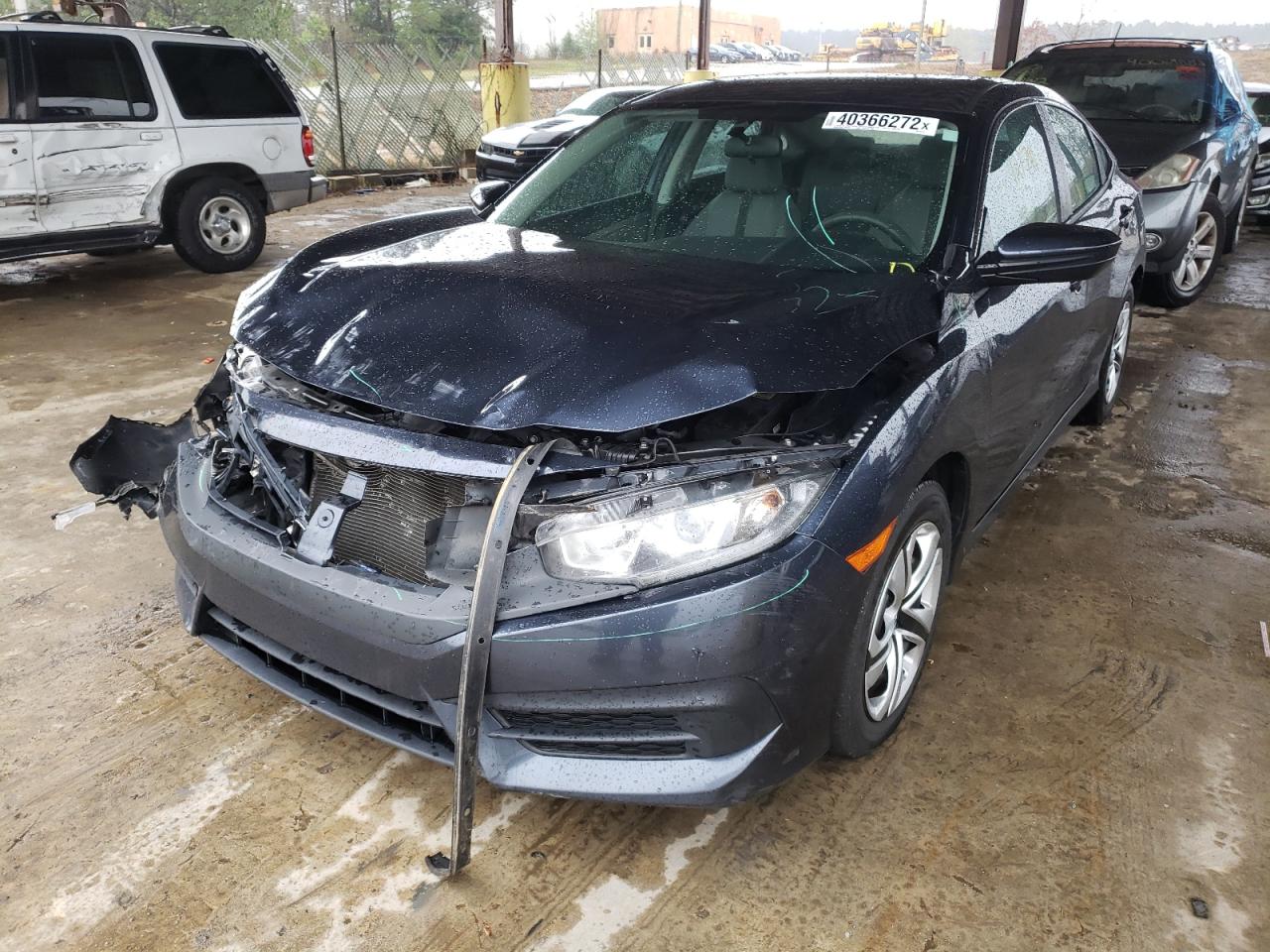 Photo 2 from auction – 2016 HONDA CIVIC LX with VIN 19XFC2F57GE041114