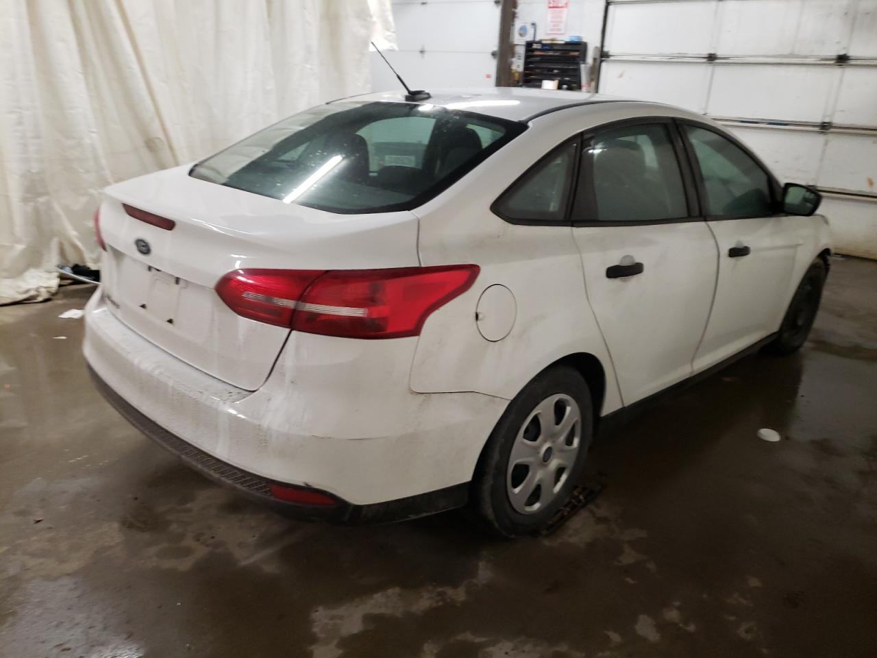 Photo 4 from auction – 2016 FORD FOCUS S with VIN 1FADP3E27GL357439