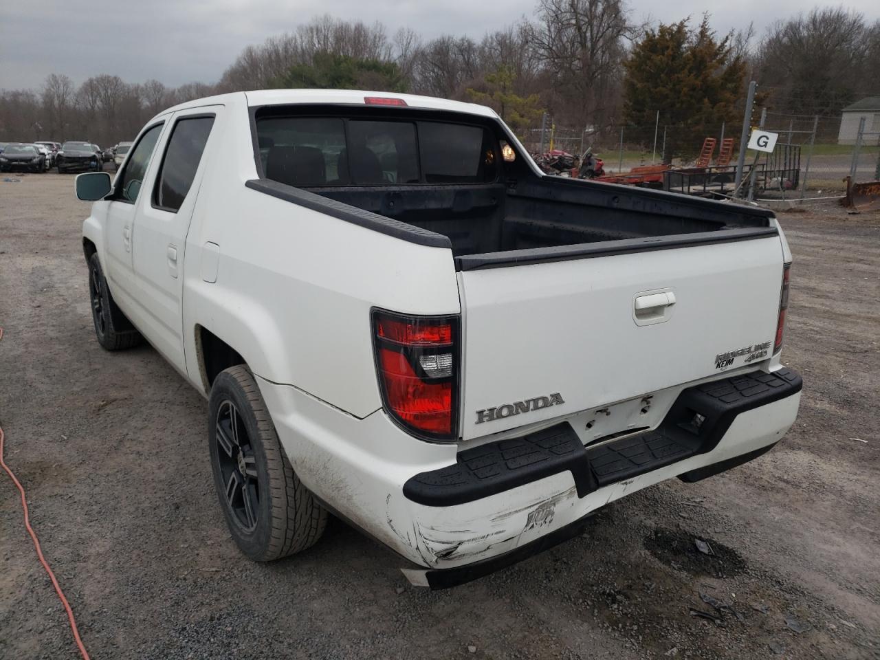 Photo 3 from auction – 2013 HONDA RIDGELINE with VIN 5FPYK1F70DB502027