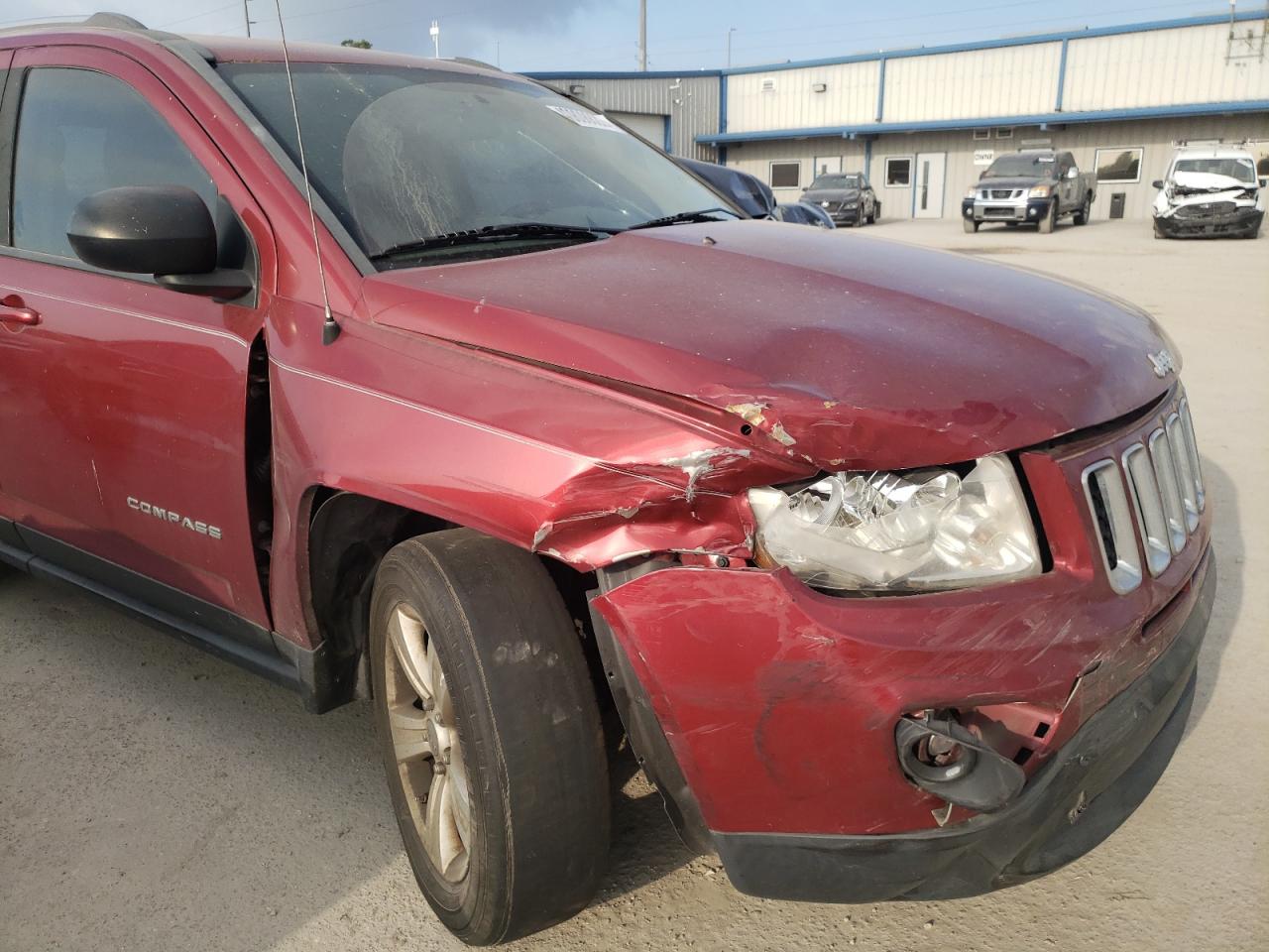 Photo 9 from auction – 2012 JEEP COMPASS LA with VIN 1C4NJCEB5CD657324