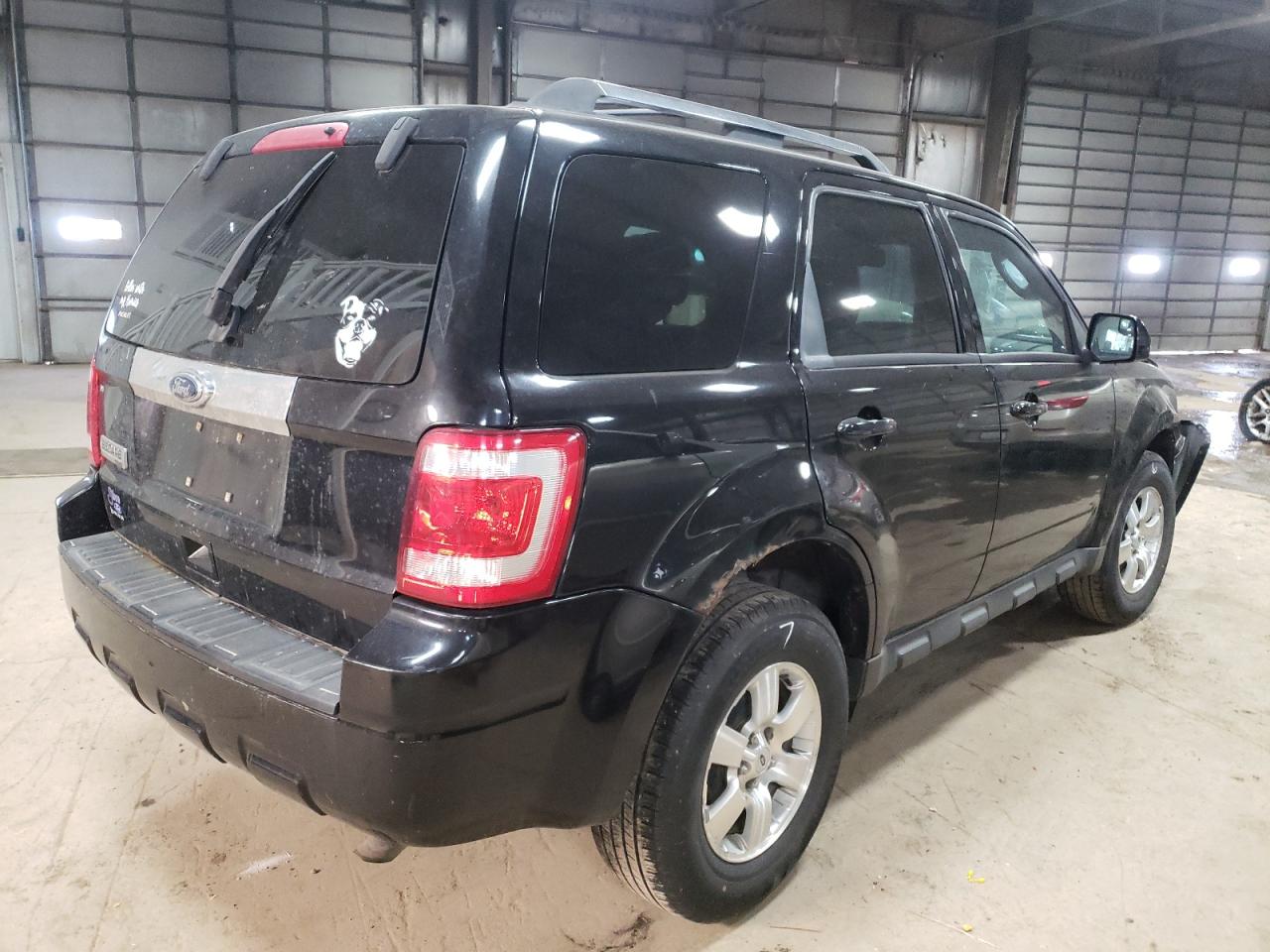 Photo 4 from auction – 2010 FORD ESCAPE LIM with VIN 1FMCU0E75AKA33200