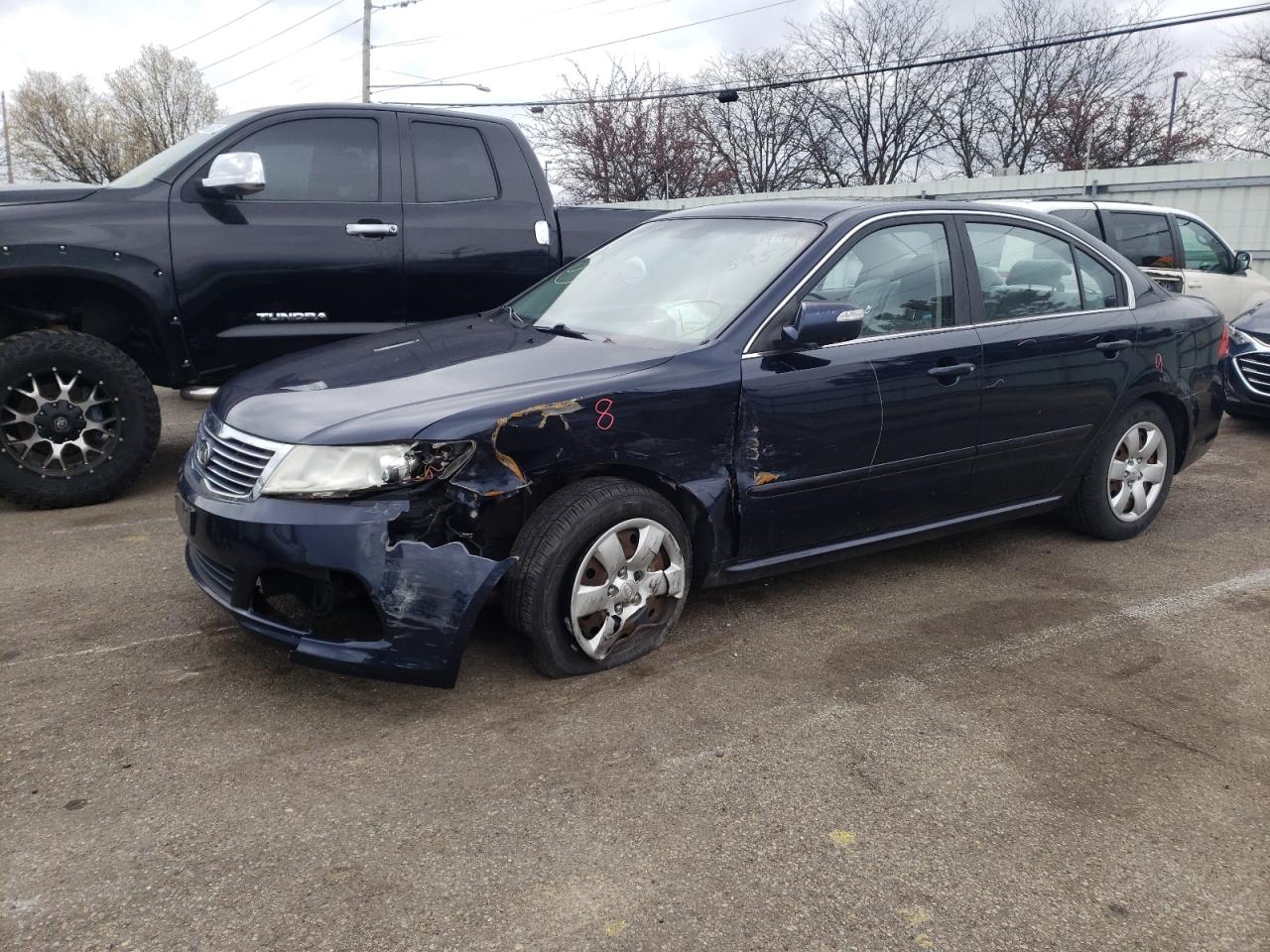 Photo 2 from auction – 2009 KIA OPTIMA LX with VIN KNAGE228095306904