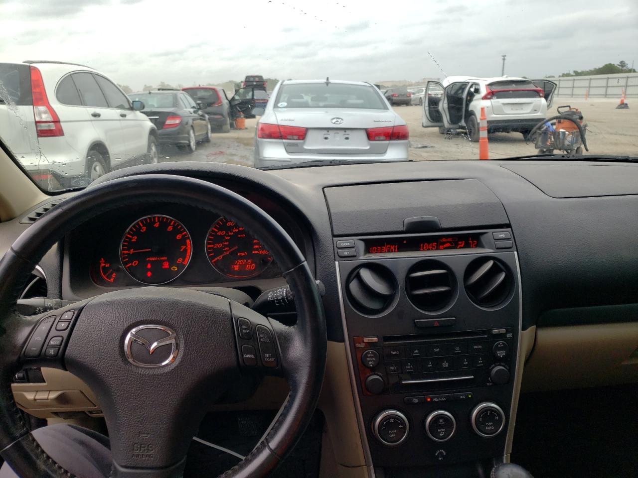 Photo 9 from auction – 2007 MAZDA 6 S with VIN 1YVHP81DX75M24081