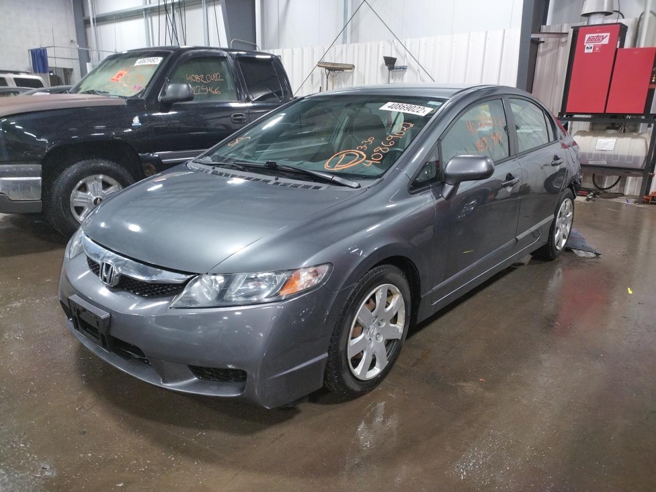 Photo 2 from auction – 2011 HONDA CIVIC LX with VIN 19XFA1E5XBE015018