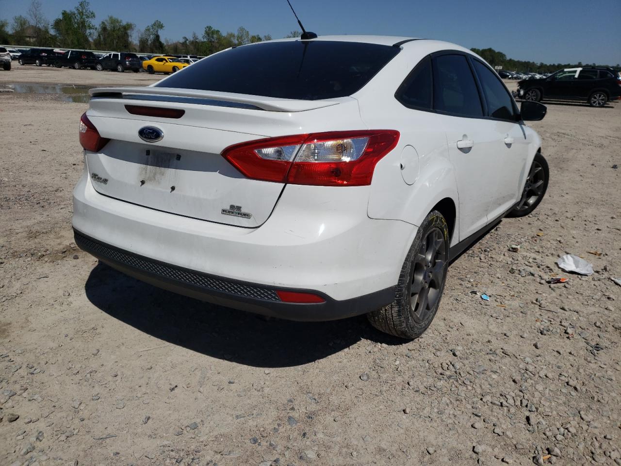 Photo 4 from auction – 2013 FORD FOCUS SE with VIN 1FADP3F28DL381212