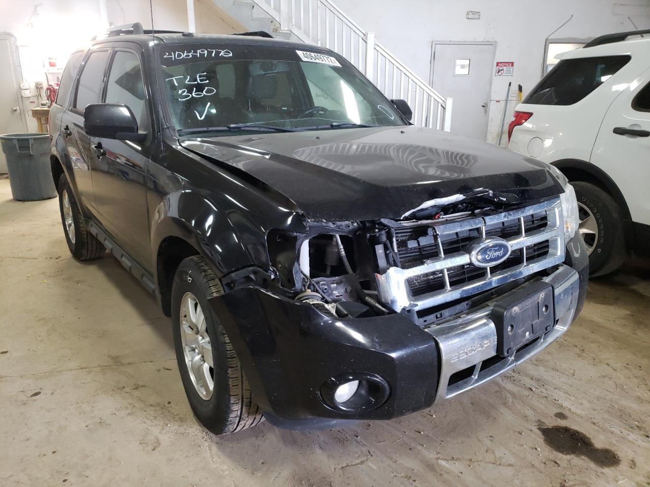 FORD ESCAPE LIM 2010 with VIN 1FMCU0E75AKA33200 - Photo from auction