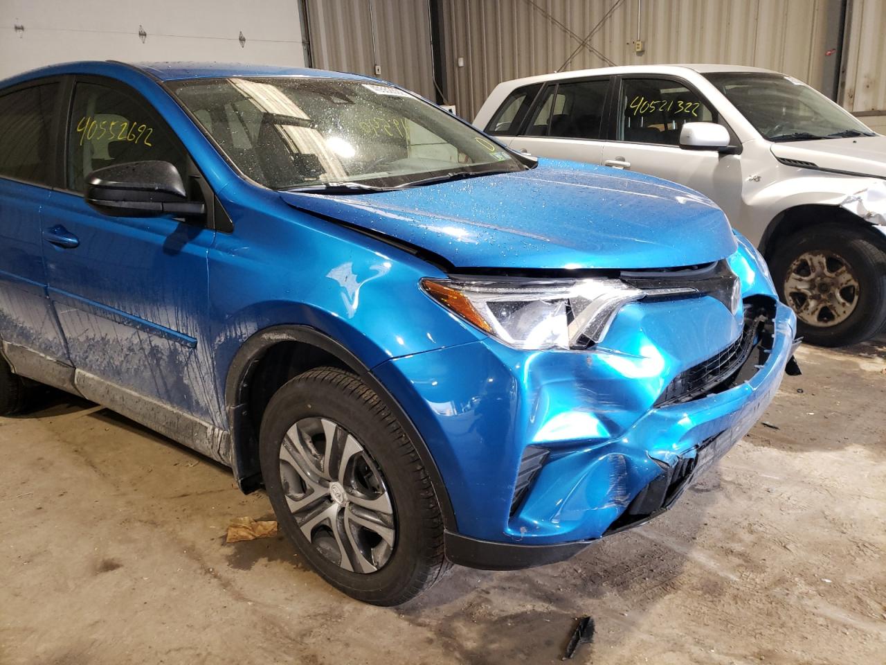 Photo 9 from auction – 2018 TOYOTA RAV4 LE with VIN JTMBFREVXJJ181569