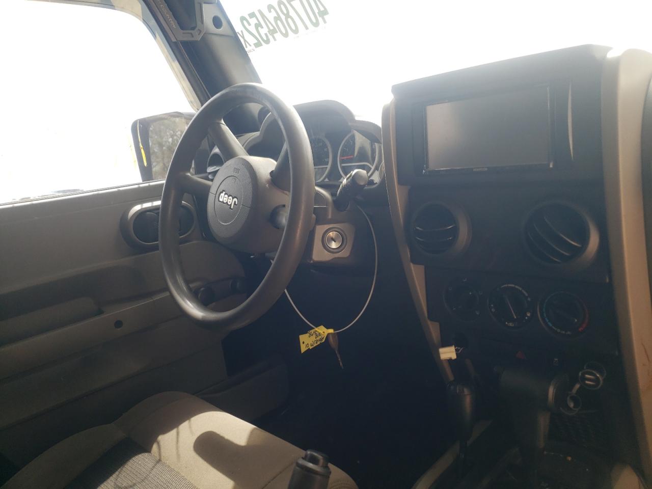 Photo 9 from auction – 2010 JEEP WRANGLER U with VIN 1J4BA3H17AL163064
