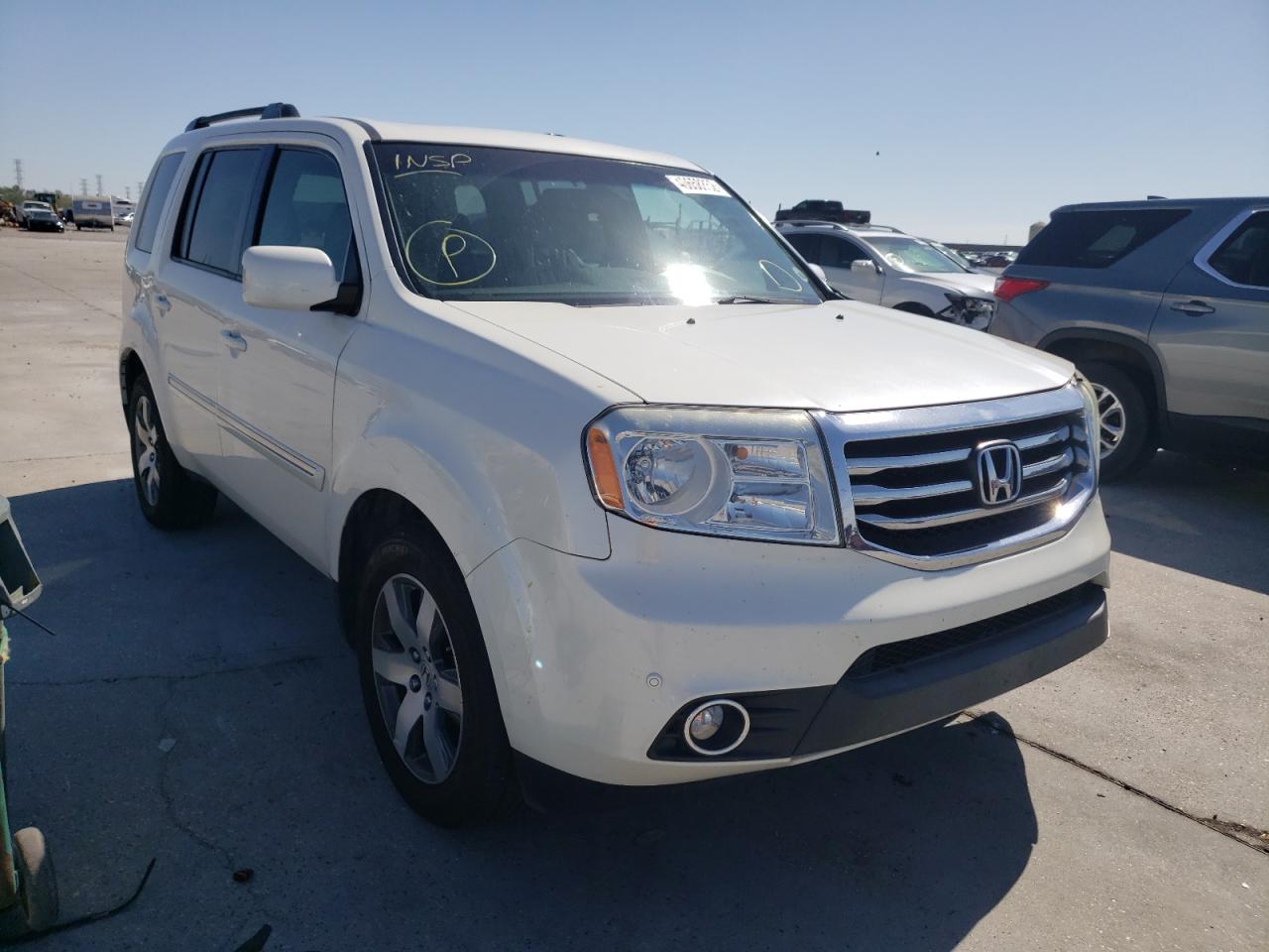 HONDA PILOT TOUR 2014 with VIN 5FNYF4H96EB009211 - Photo from auction