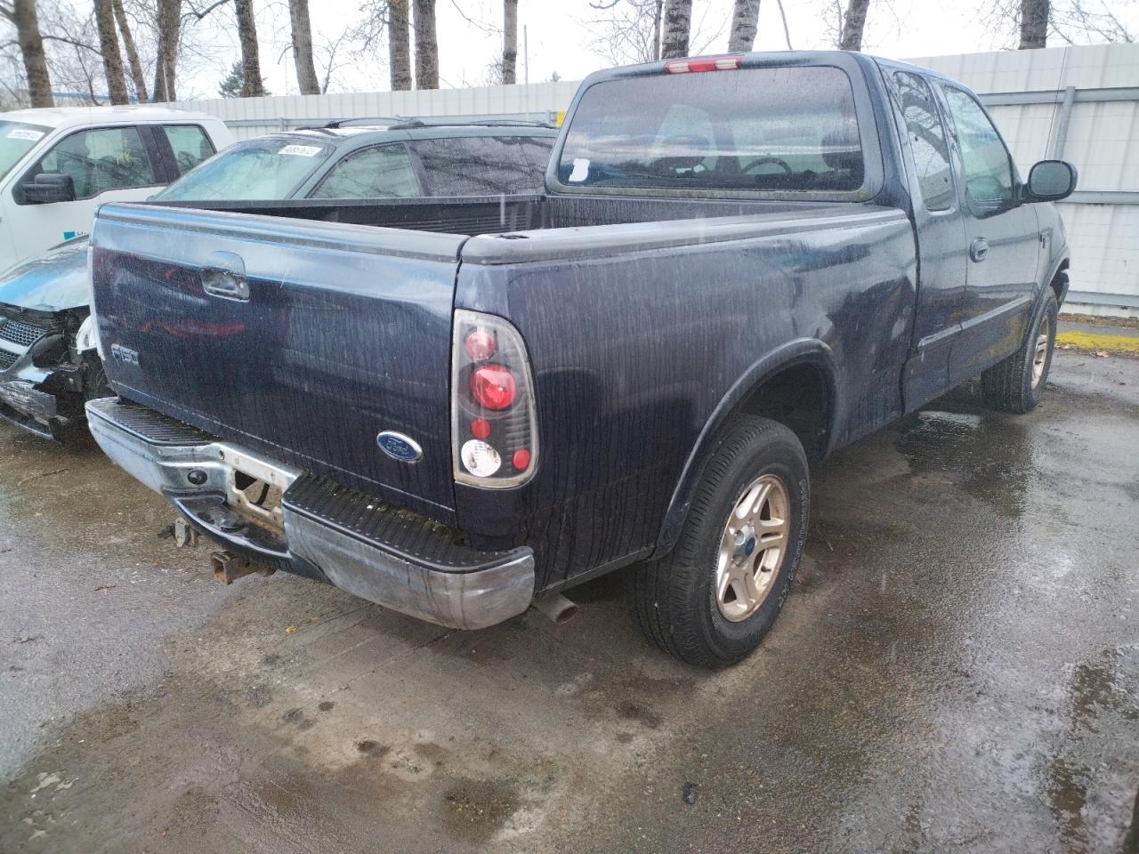 Photo 4 from auction – 2001 FORD F150 with VIN 2FTRX18W91CA77557