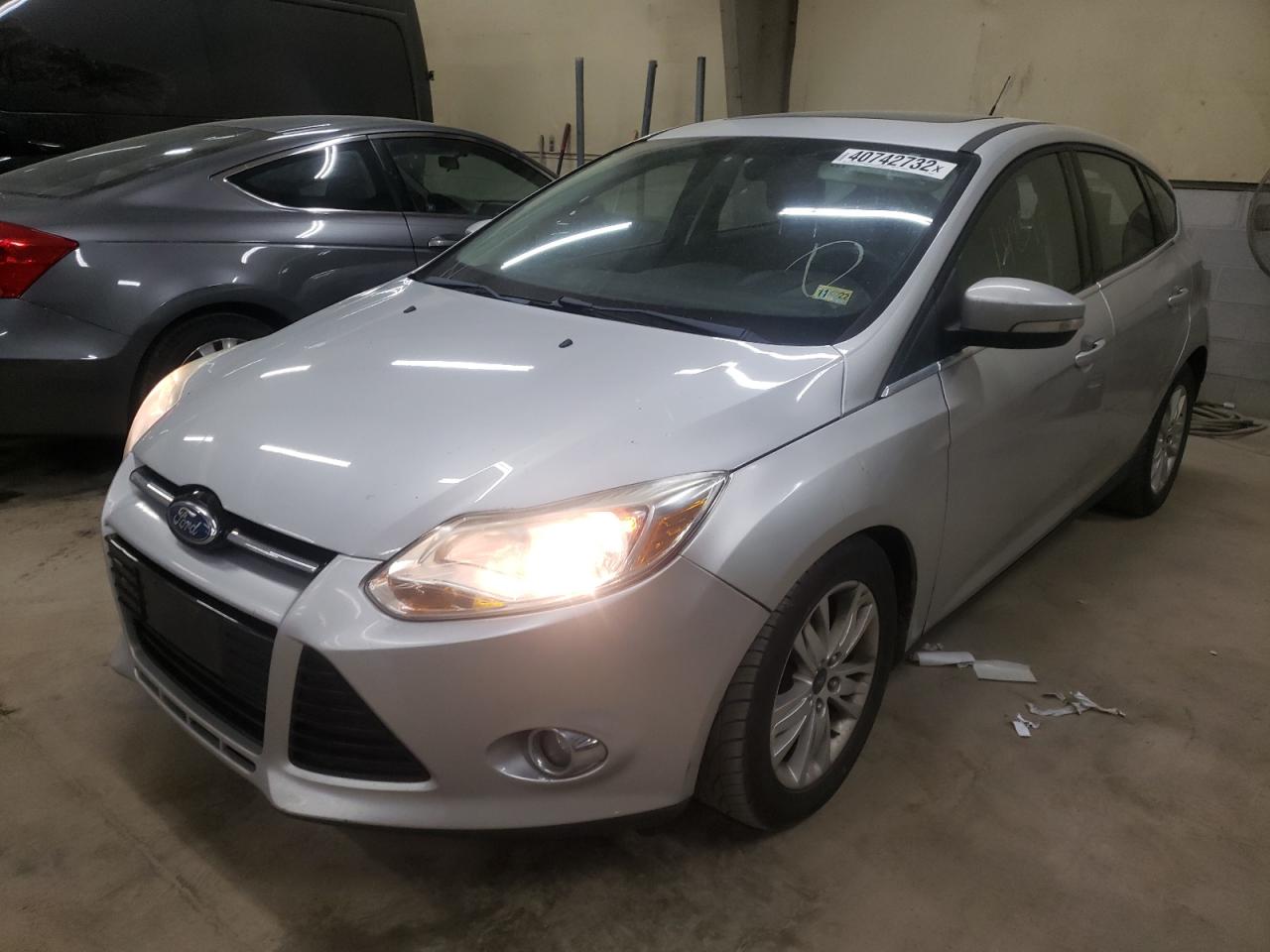 Photo 2 from auction – 2012 FORD FOCUS SEL with VIN 1FAHP3M27CL200829
