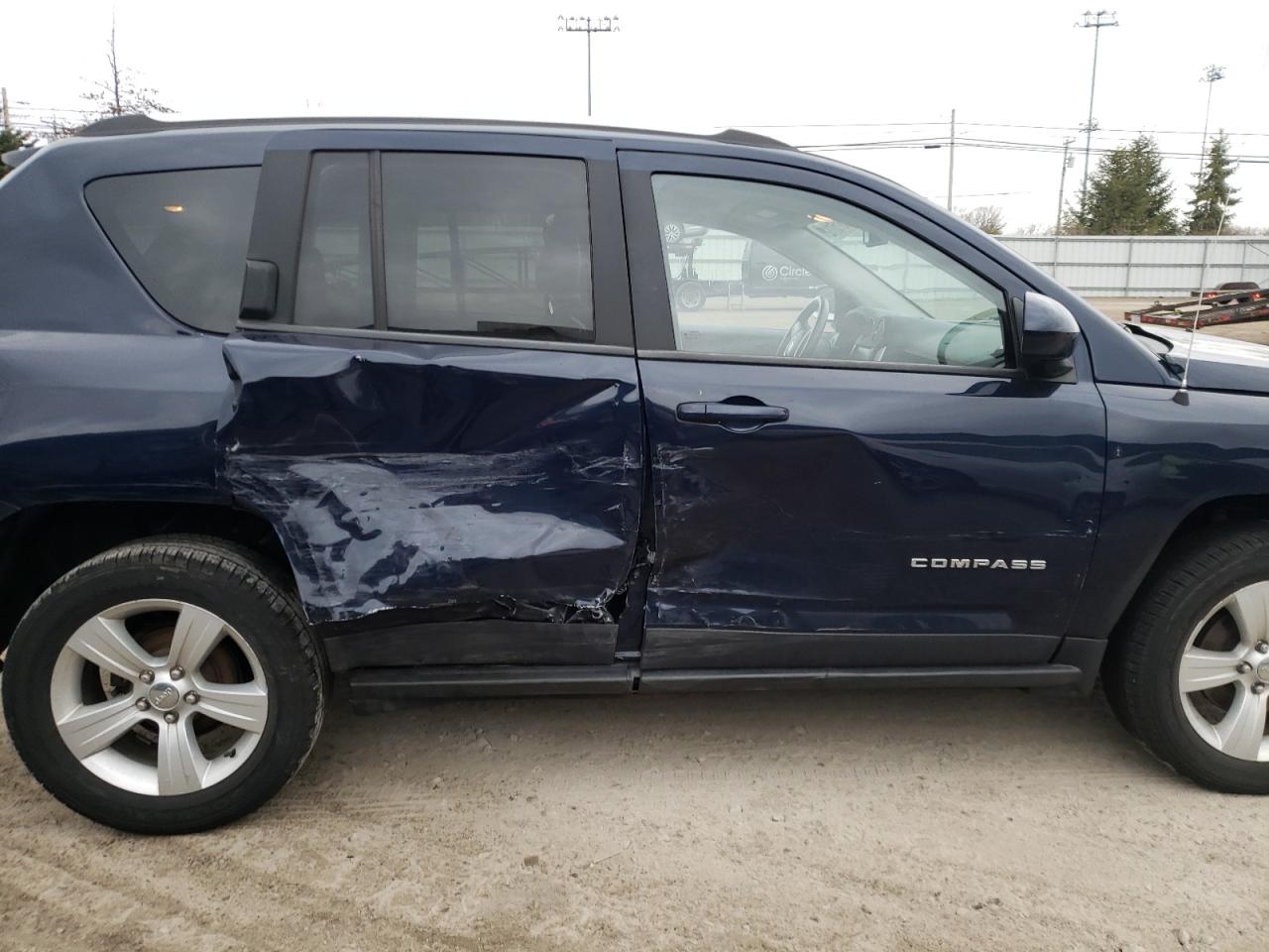 Photo 9 from auction – 2014 JEEP COMPASS LA with VIN 1C4NJDEB5ED646297