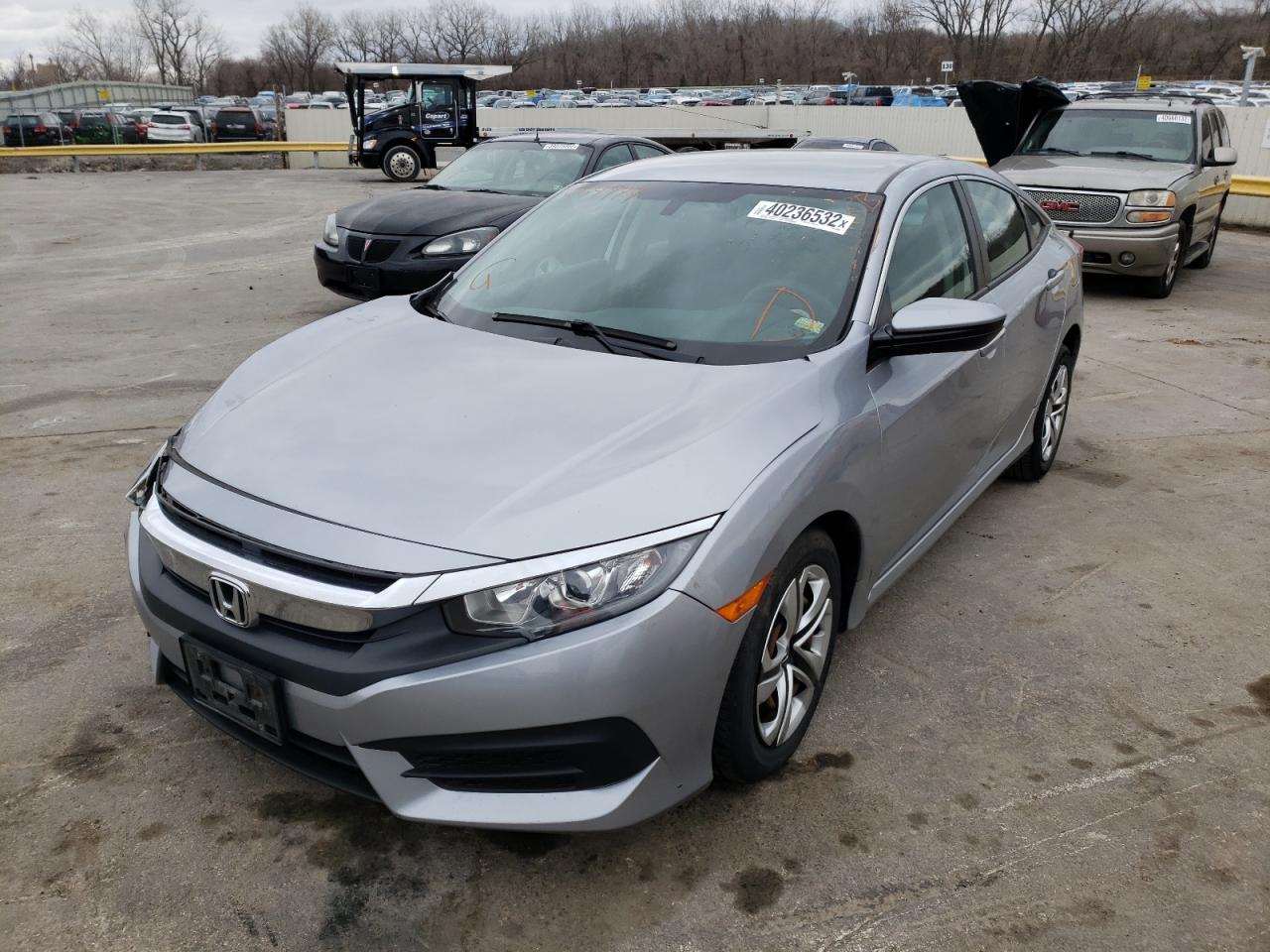 Photo 2 from auction – 2016 HONDA CIVIC LX with VIN 19XFC2F51GE064999