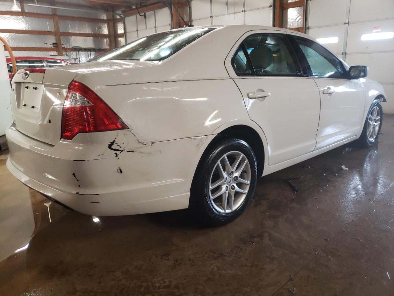 Photo 4 from auction – 2011 FORD FUSION S with VIN 3FAHP0GA4BR143622