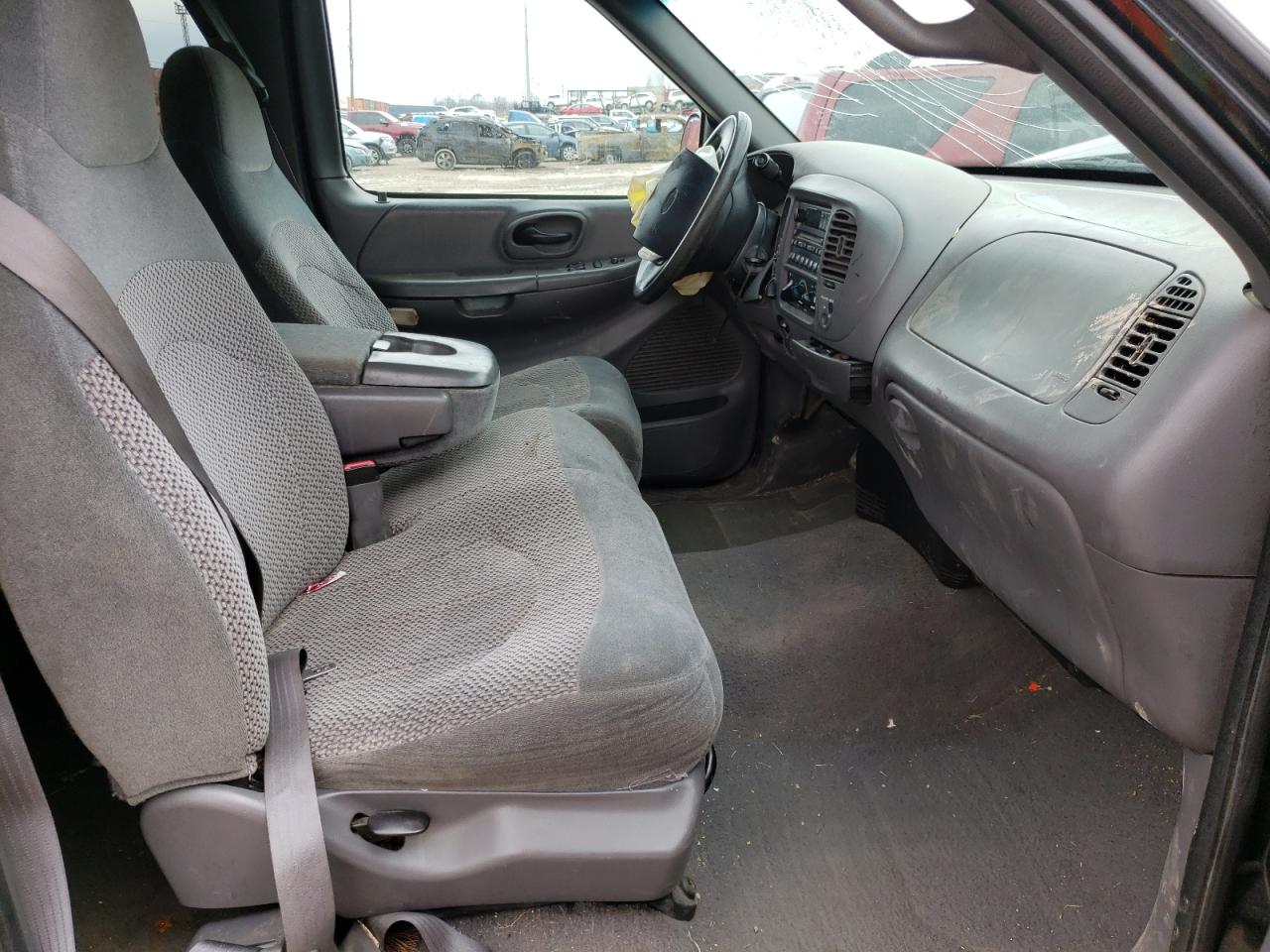 Photo 5 from auction – 1999 FORD F150 with VIN 2FTRX08L1XCB14674