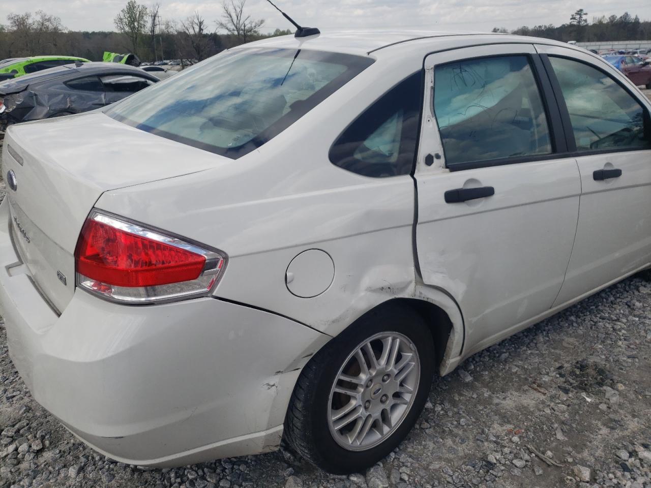 Photo 20 from auction – 2010 FORD FOCUS SE with VIN 1FAHP3FN2AW253991