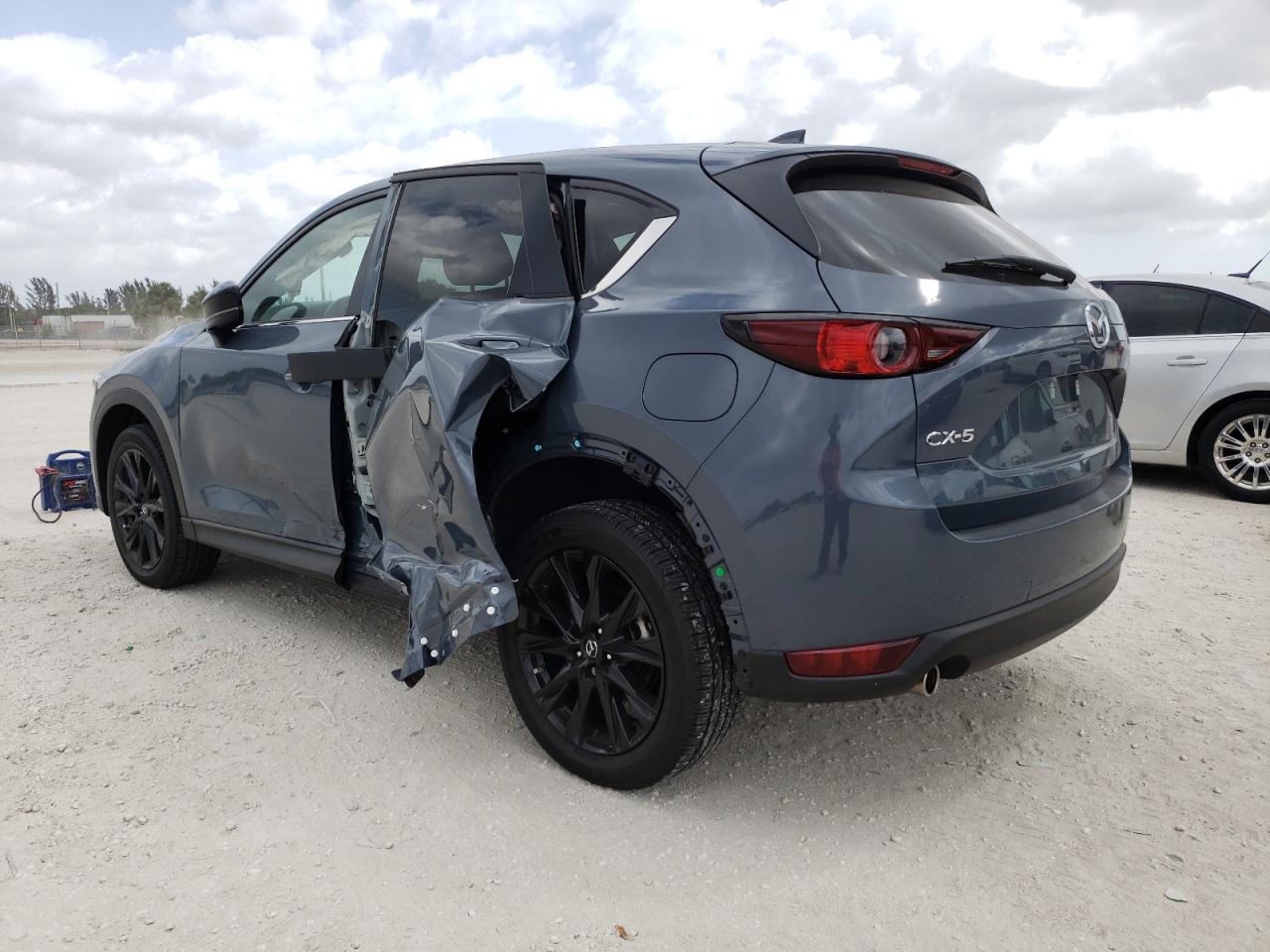 Photo 3 from auction – 2021 MAZDA CX-5 TOURI with VIN JM3KFACM3M0418027