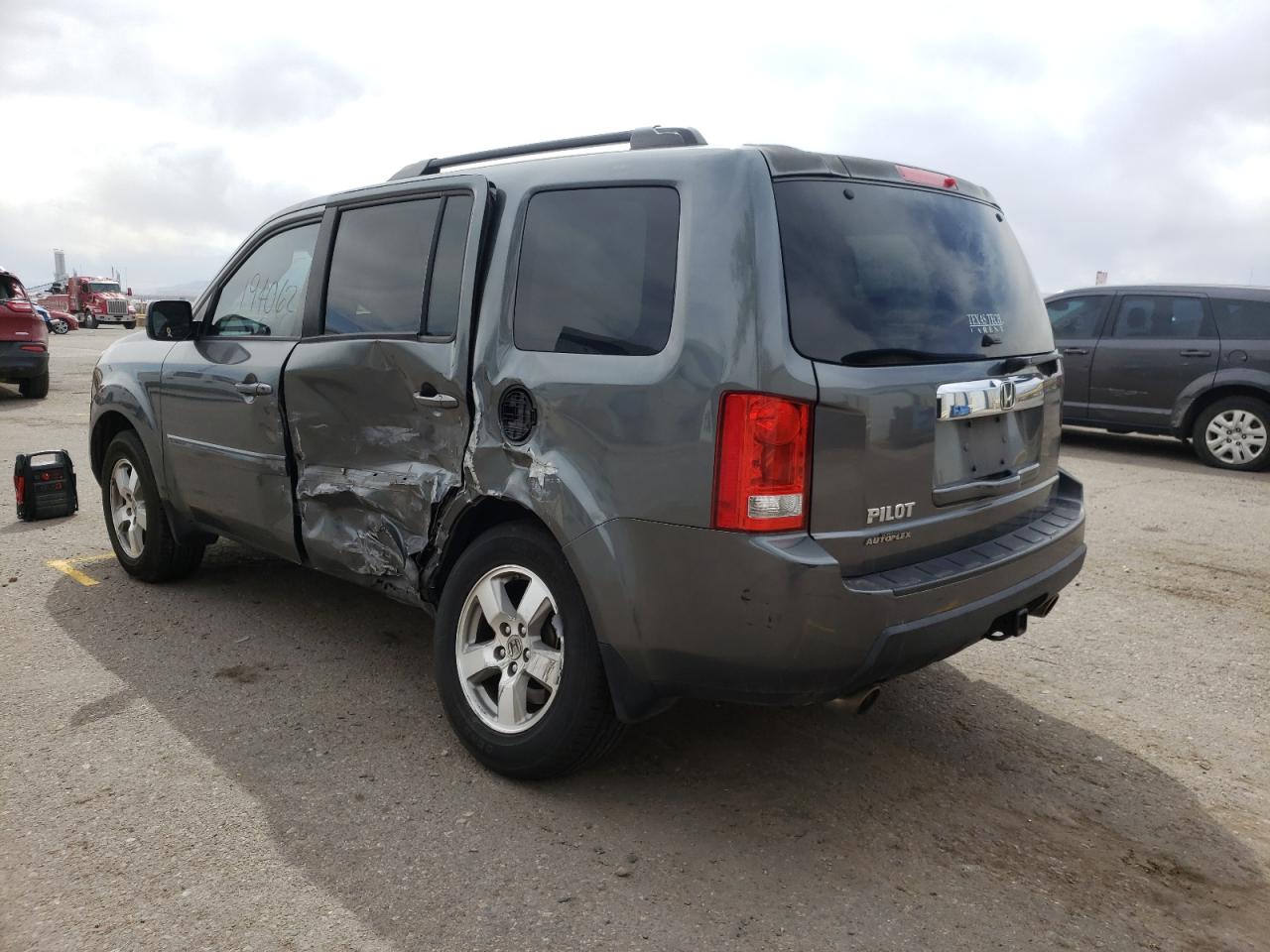 Photo 9 from auction – 2011 HONDA PILOT EX with VIN 5FNYF3H49BB041502