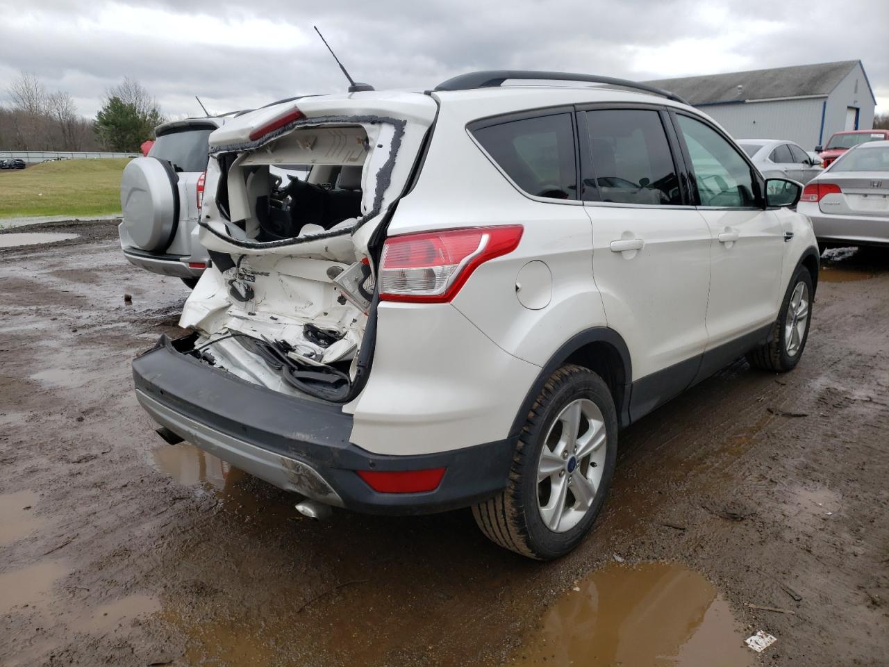 Photo 4 from auction – 2014 FORD ESCAPE SE with VIN 1FMCU9G97EUE49813