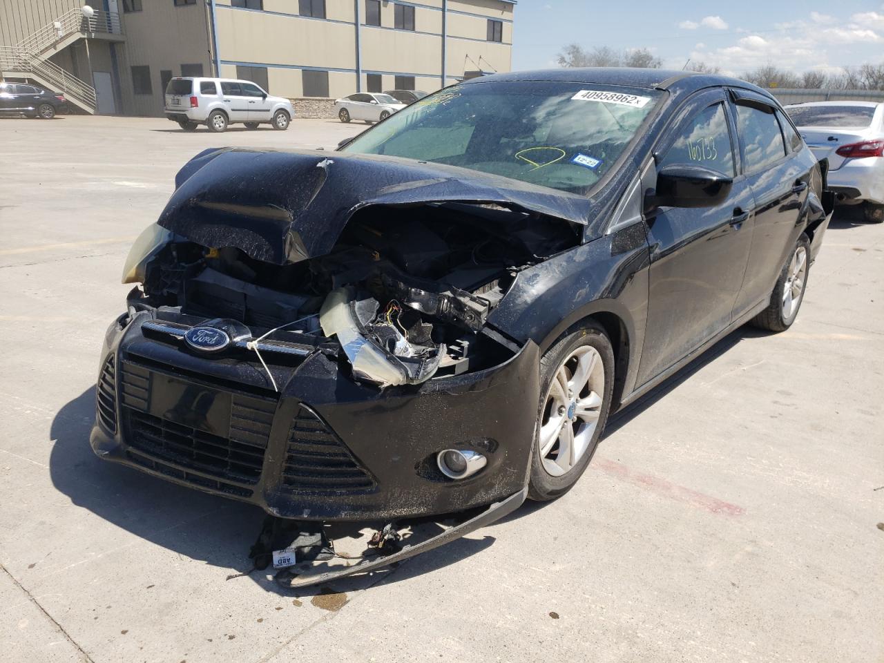 Photo 2 from auction – 2012 FORD FOCUS SE with VIN 1FAHP3F25CL312879